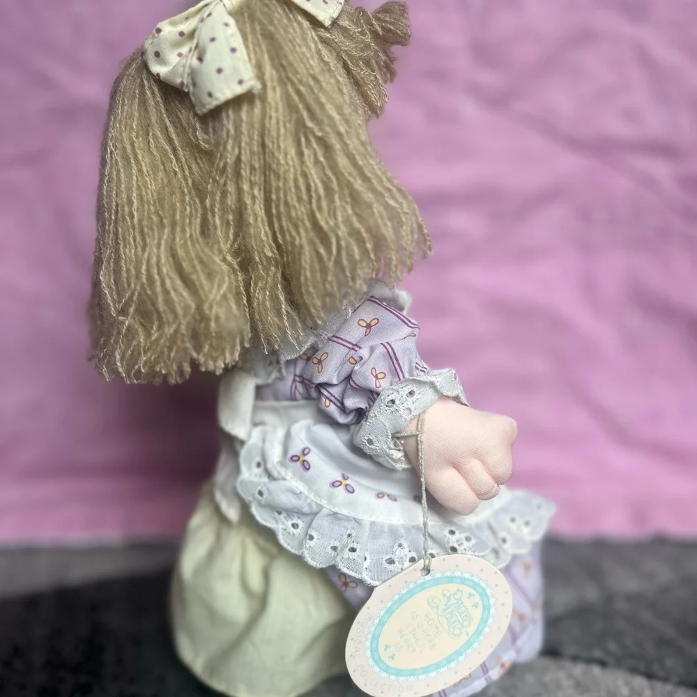 Precious Moments tags cloth features
